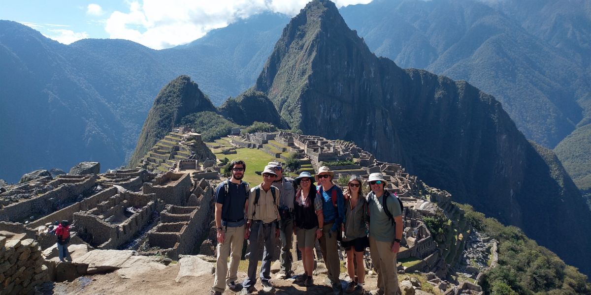 Group of Friends outside Macchu Picchu