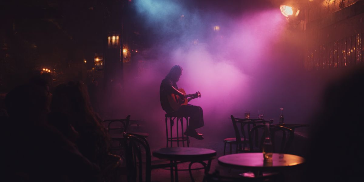Artist playing in a dimly lit, smoky club