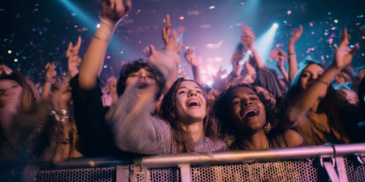 Friends in the front row of a concert