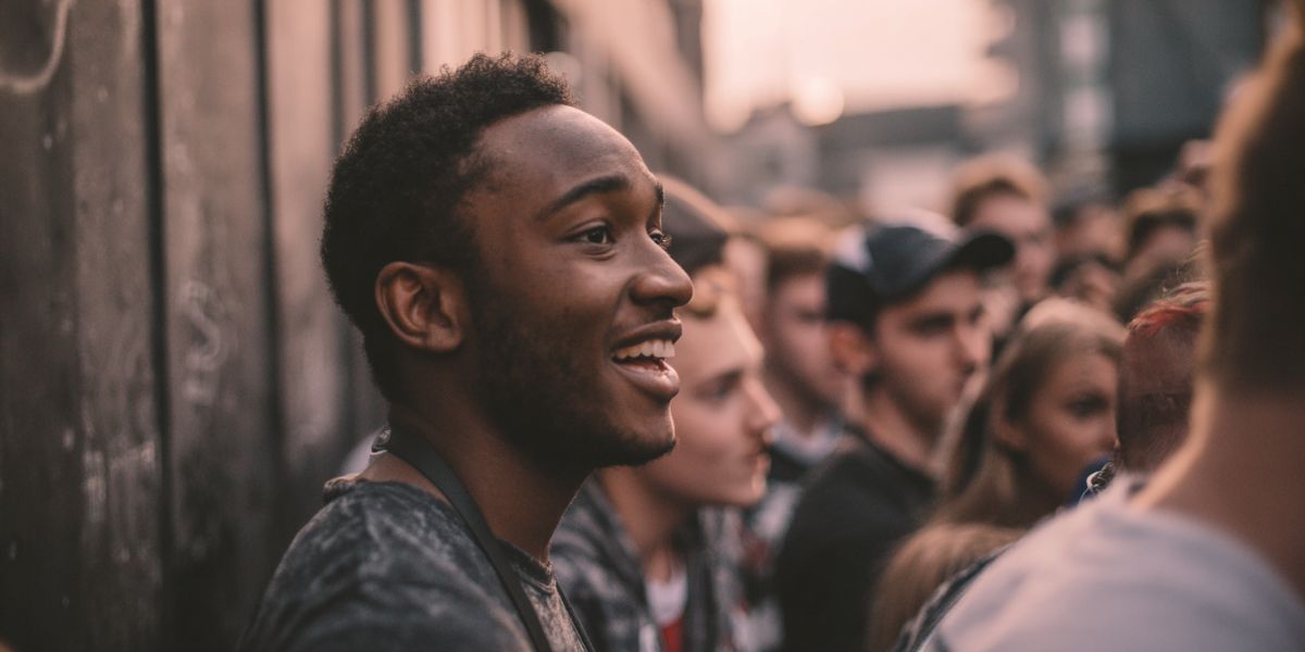 Guy standing in the queue waiting to go into a venue